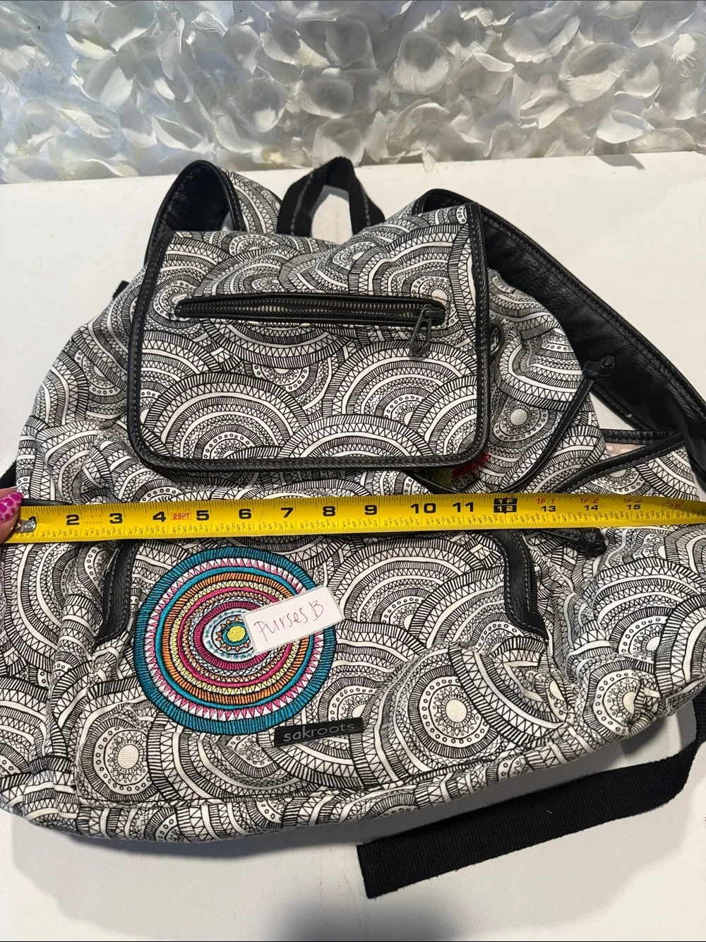 Sakroots Black & White Patterned Backpack with Multicolor Embroidered Circle